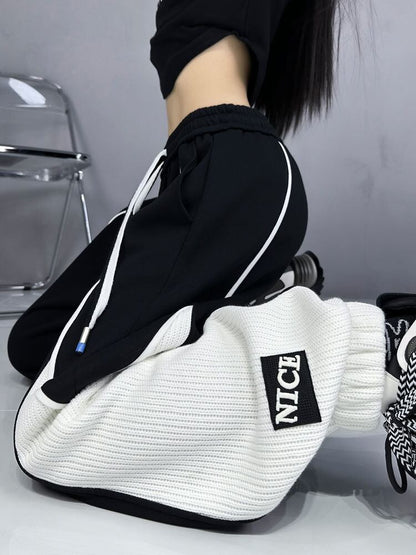 大人可愛い 個性的なデザイン スタイルアップ 2色 ジョガーパンツ E-10763