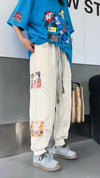 大活躍 高見えデザイン スタイルアップ効果抜群 切り替え プリント 全4色 カジュアルパンツE-9358