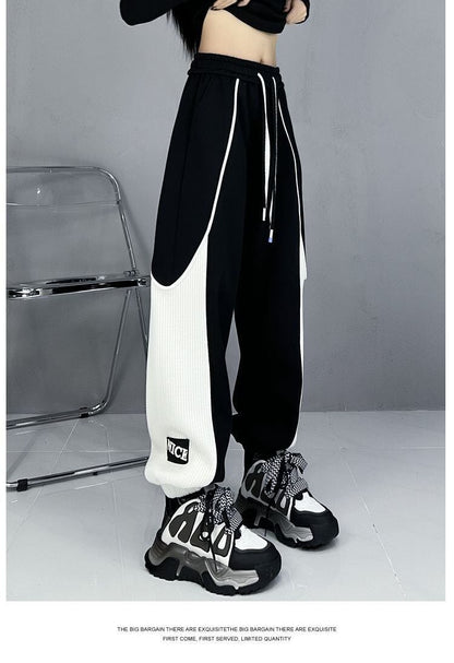 大人可愛い 個性的なデザイン スタイルアップ 2色 ジョガーパンツ E-10763
